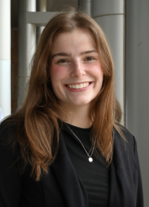 A woman smiling. 